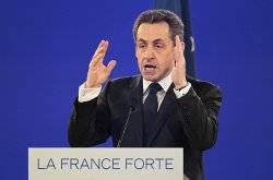 Sarkozy threatens 