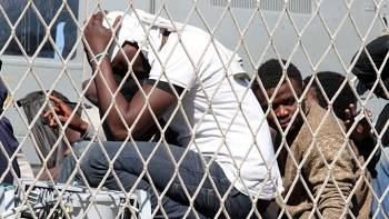 Rescued migrants arrive in Italy port