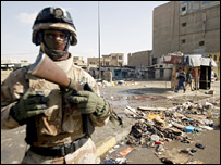 Scores killed in Iraq market blasts