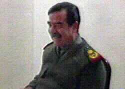 Saddam Shown on Iraqi TV, Laughing with Ministers