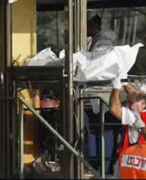 Woman Bomber Kills At Least 19 in Israel Restaurant