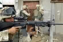 US Soldiers Kill Iraqi TV Employees as Bush Names His Ambassador to Baghdad